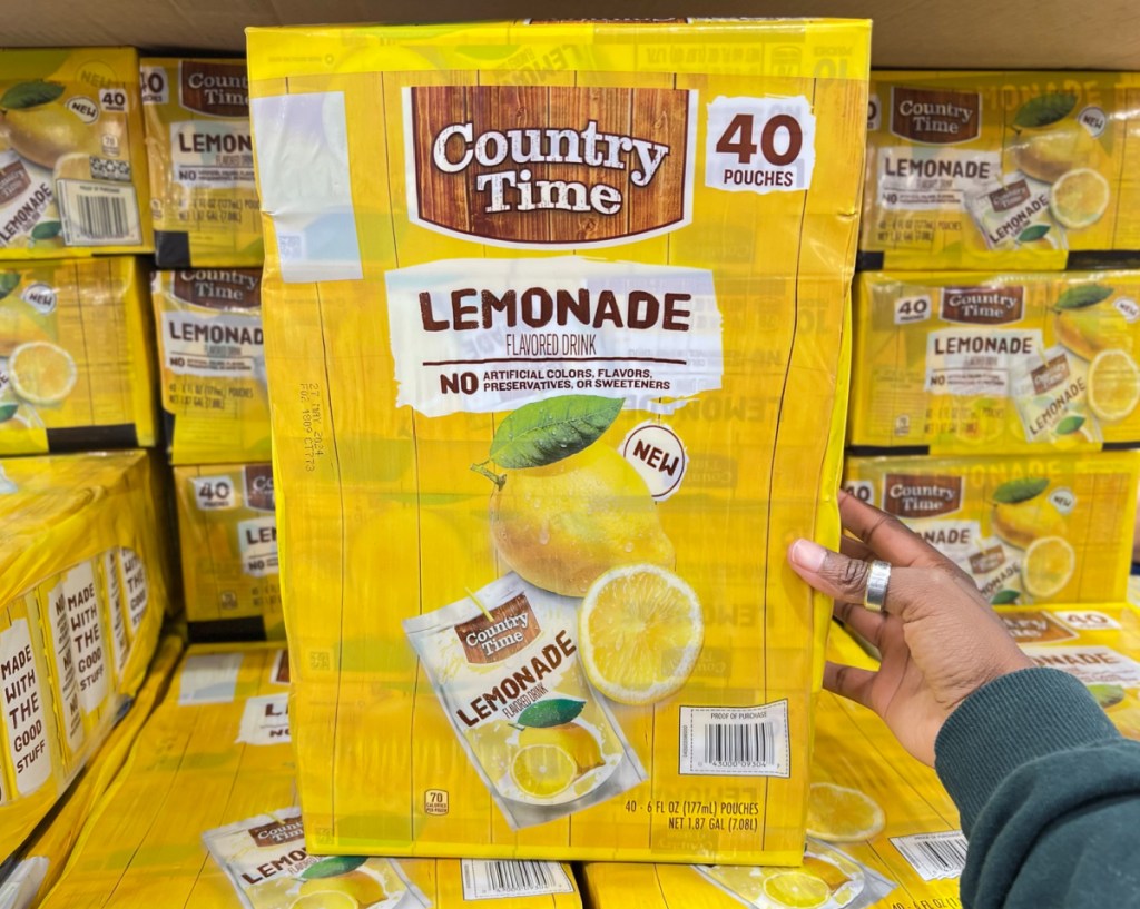 woman holding country time lemonade 40 count