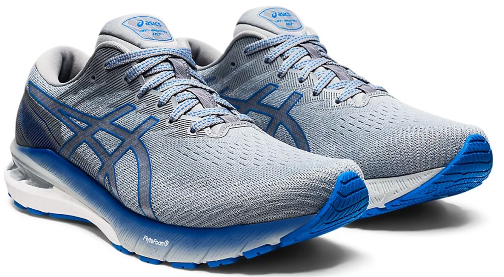 pair of blue and grey asics running shoes