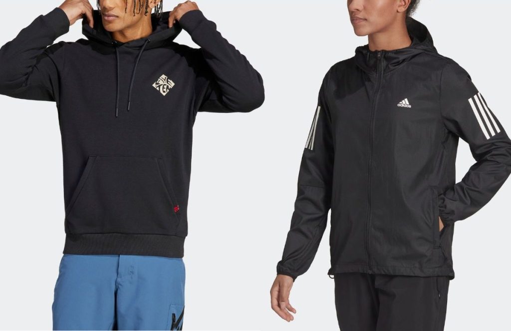 man wearing an adidas hoodie and a woman wearing an adidas windbreaker