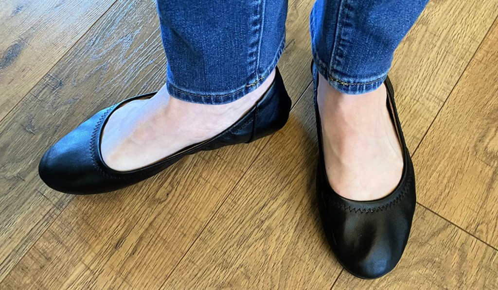 Woman's feet wearing Amazon Essentials Ballet Flats