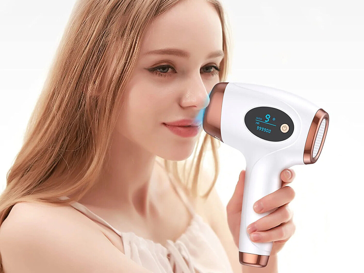 woman using an Aopvui At-Home IPL Hair Remover on her face