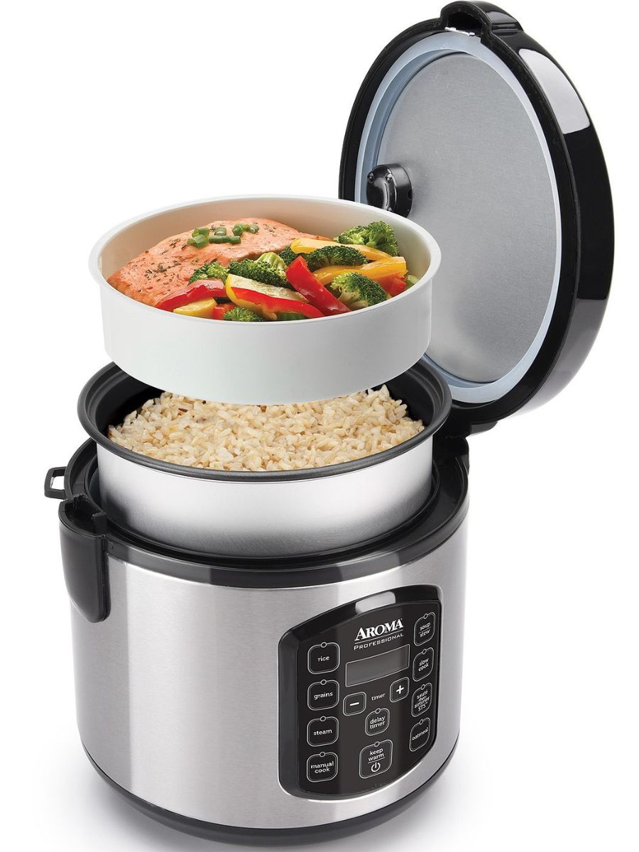 A rice cooker with rice and salmon