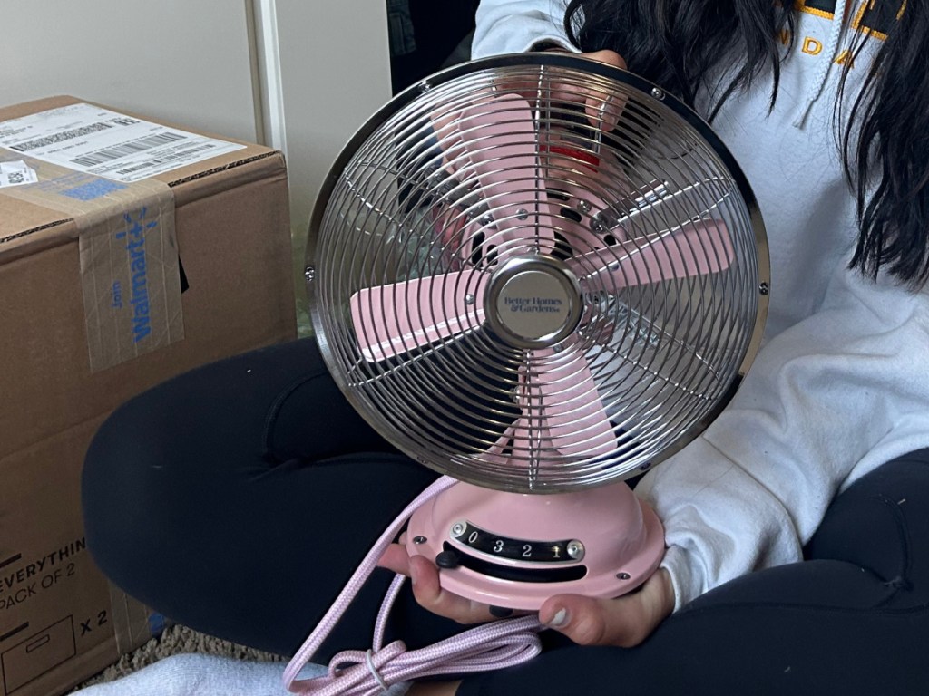 girl holding pink Better Homes Garden Retro Fan