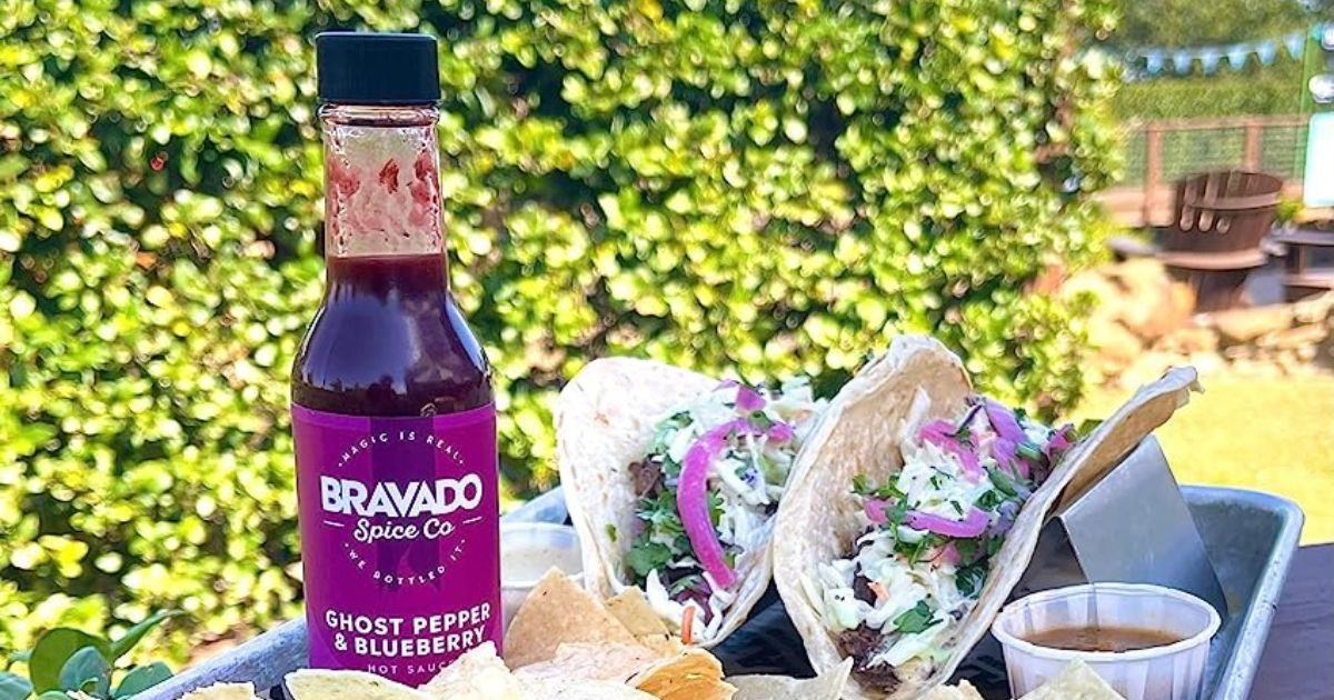 Ghost Pepper and Blueberry sauce on a tray with tacos