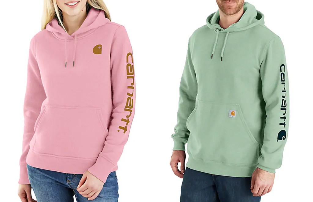 woman and man in pink and green hoodies