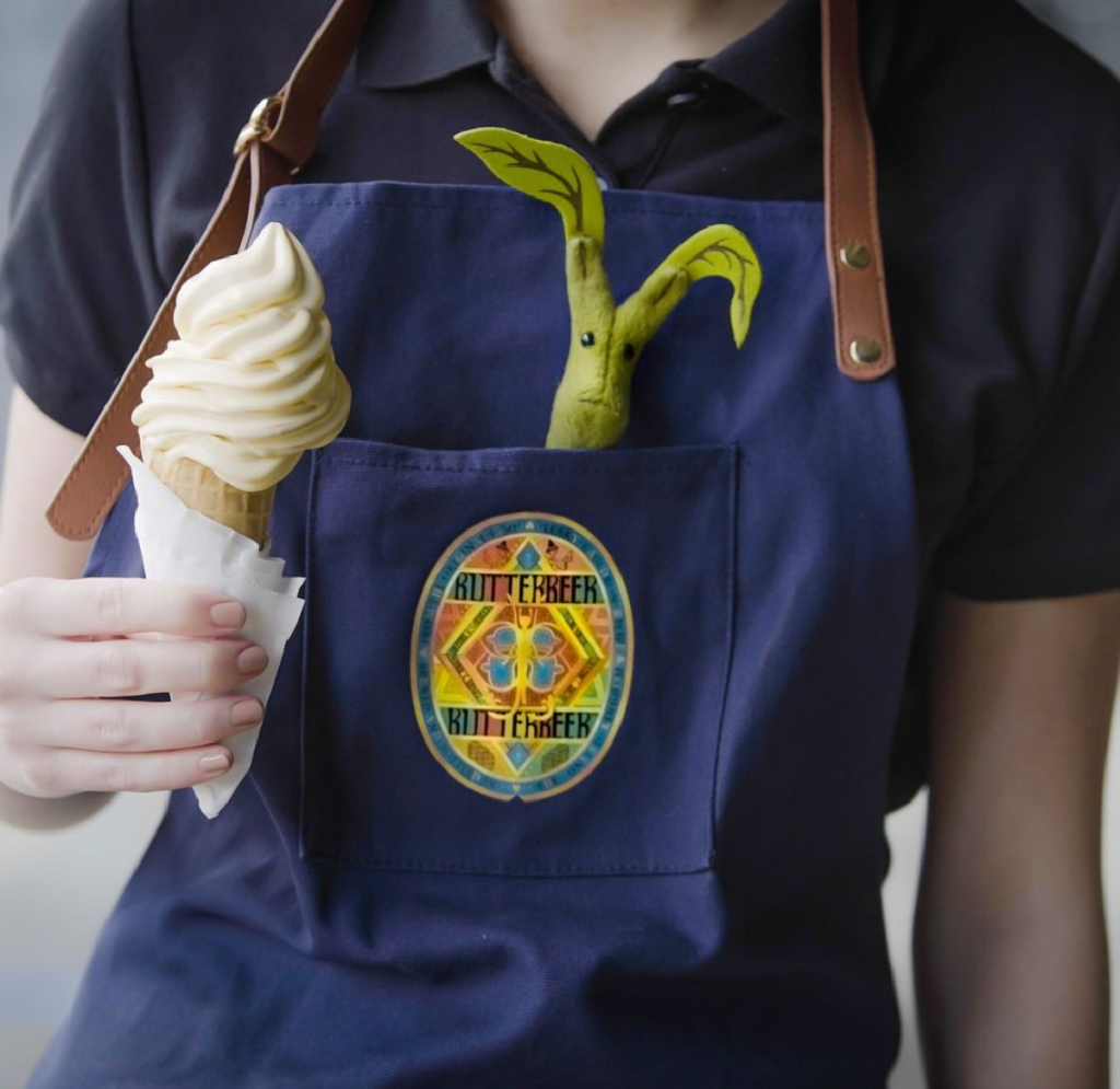 Man holding a Harry Potter butterbeer Ice Cream