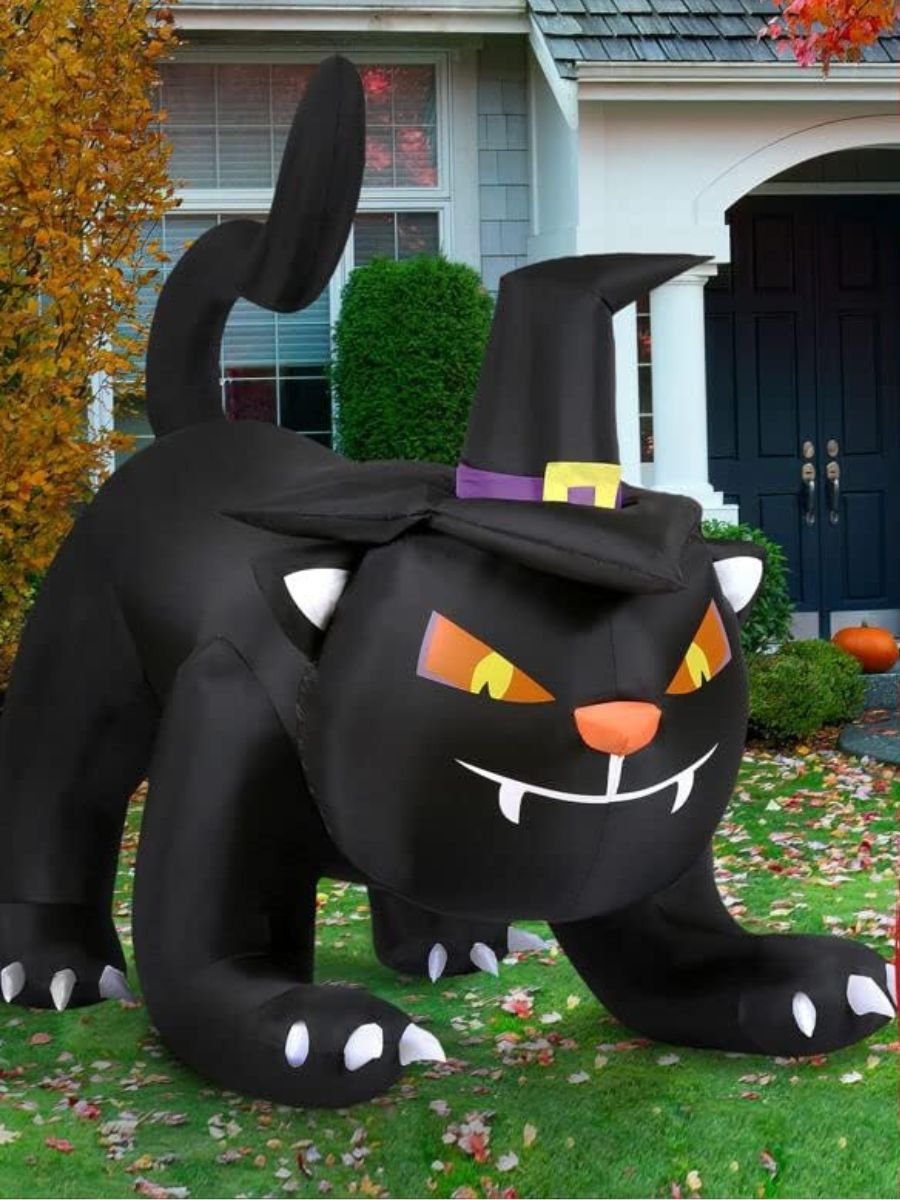 Large inflatable black cat with a witch hat