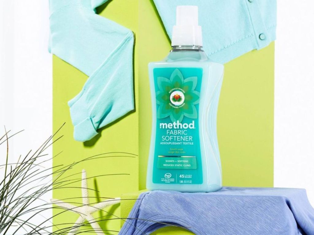  Method Fabric Softener, Beach Sage, 45 loads, Reduces Static Cling, 53.5 Ounces shown on display with clothes and beach items