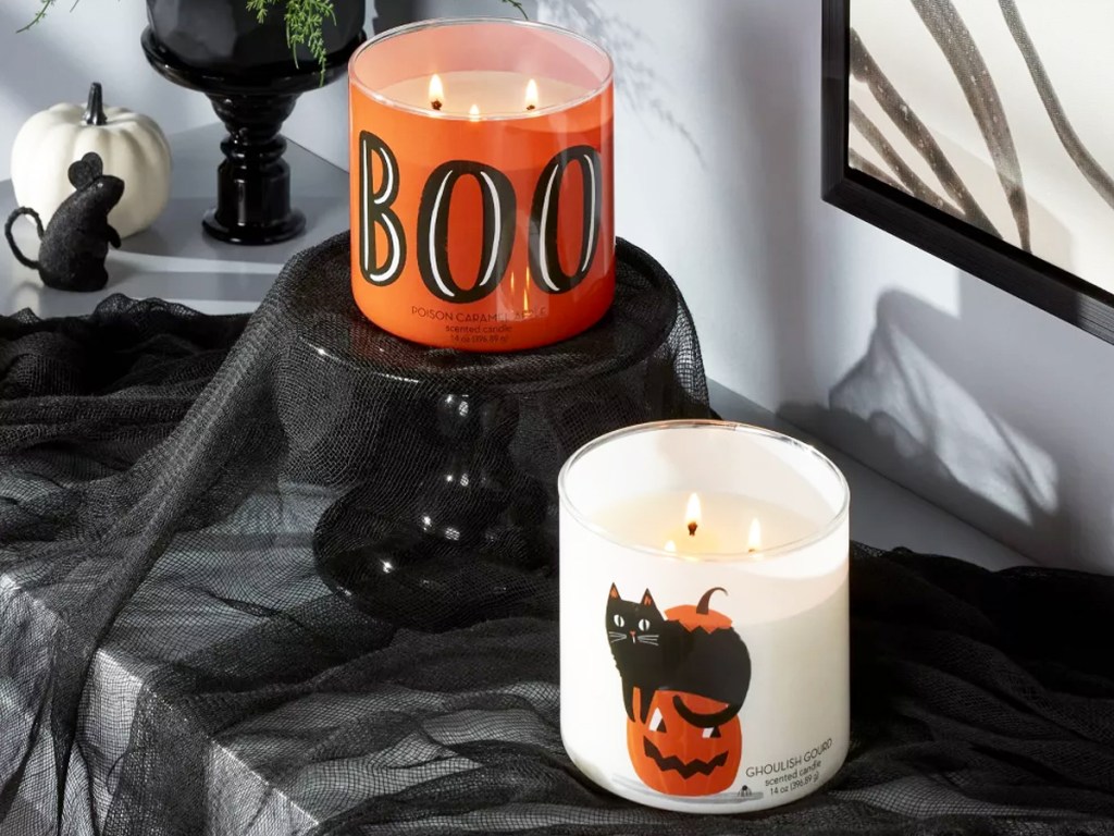 two 3-wick halloween candles