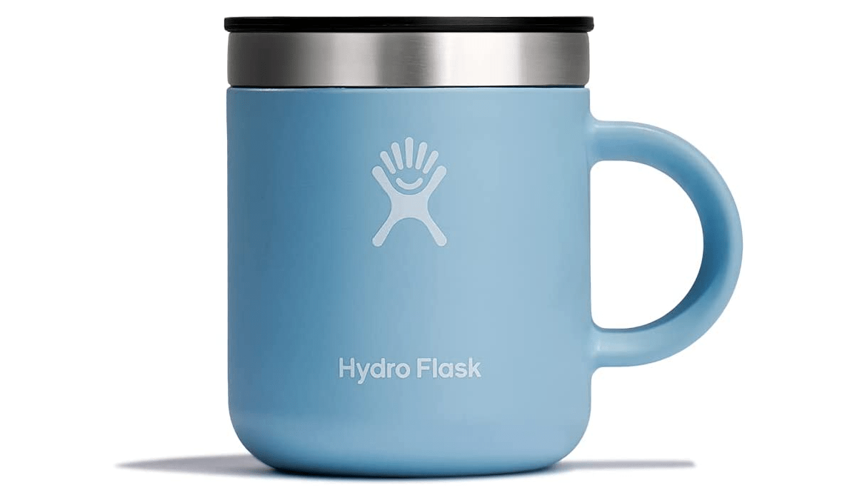 A Hydro Flask Mug with lid on 