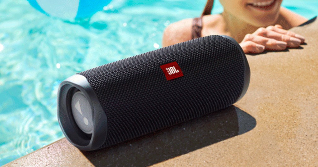 JBL Flip 5 on the side of a pool