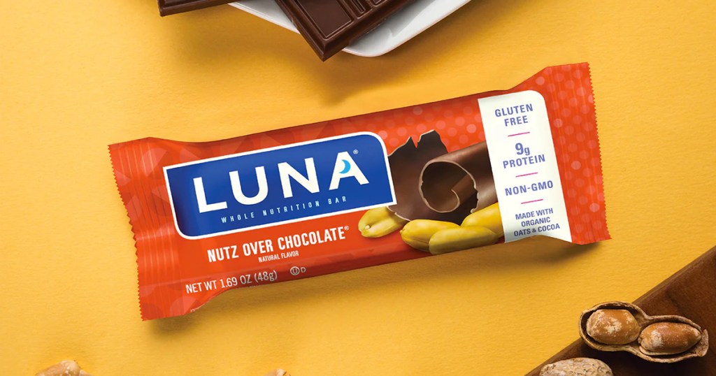 LUNA Bar Mashups Nutz Over Chocolate on a yellow background