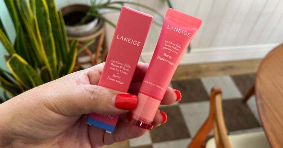 two Laneige Lip Balms in woman's hands