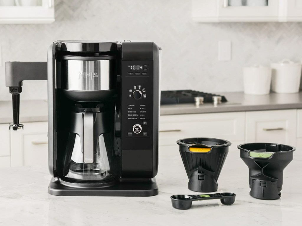 ninja coffee maker on kitchen counter with accessories