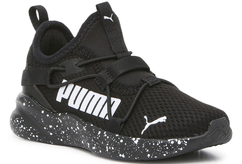 black puma sneaker with paint splatter on the sole