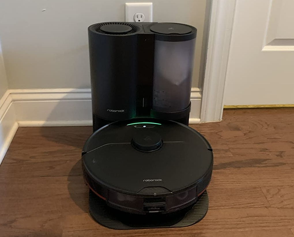 Roborock robot vacuum connected to the dock