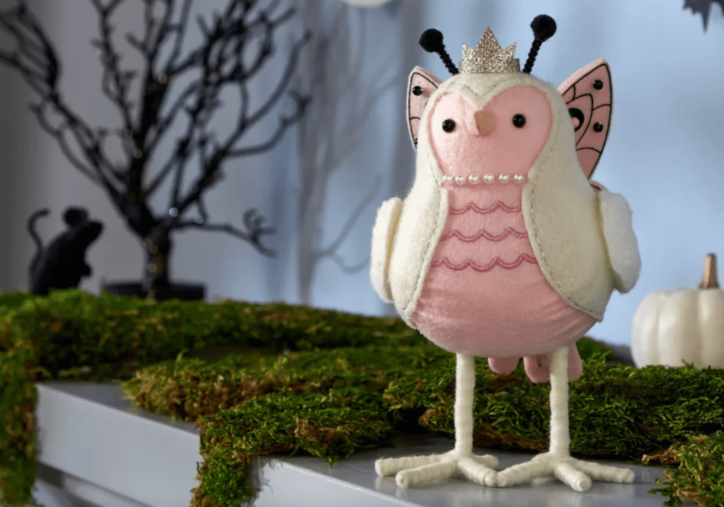 Bird figurine dressed up as a princess