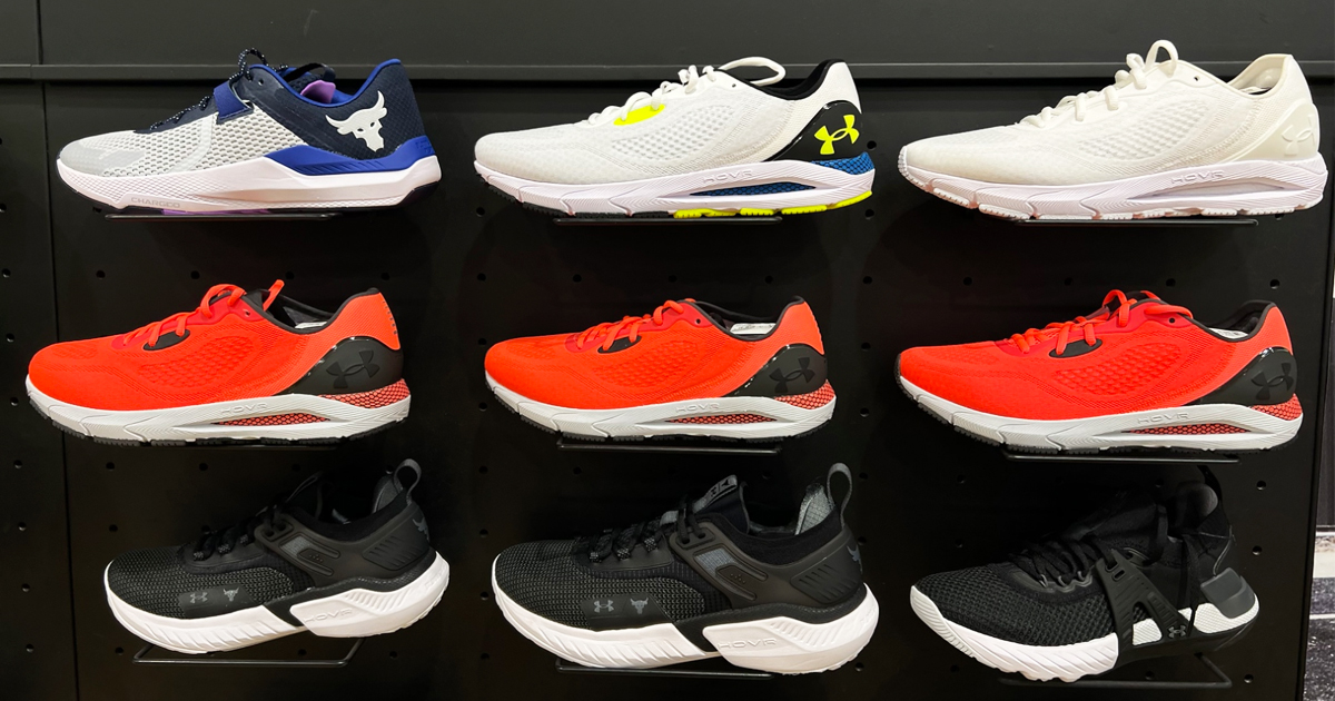display wall in store of under armour running shoes