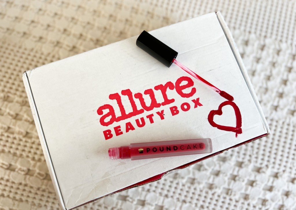 allure beauty box with lip gloss and heart on it