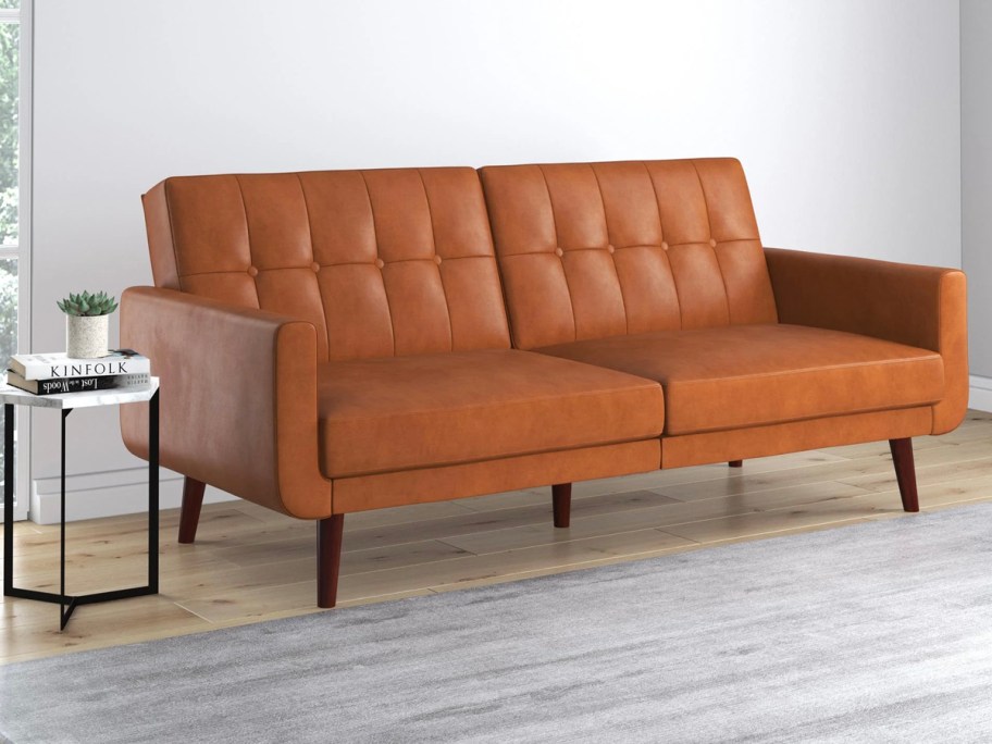 brown leather sofa in living room 