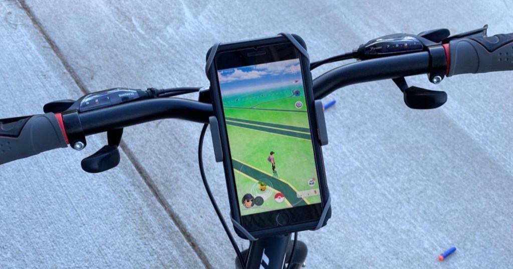 phone mounted to bike handlebars