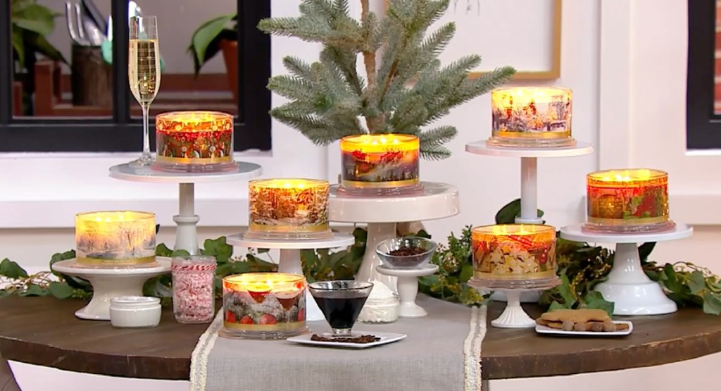 display of multiple candles on a table