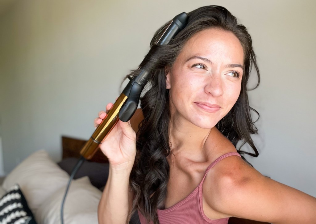 woman curling hair