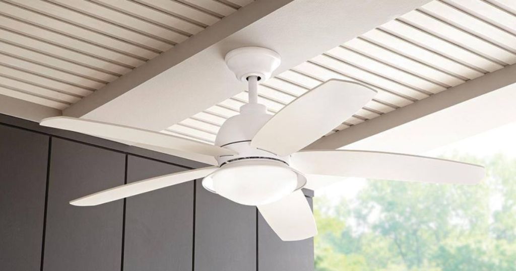 white ceiling fan hanging from white and gray ceiling