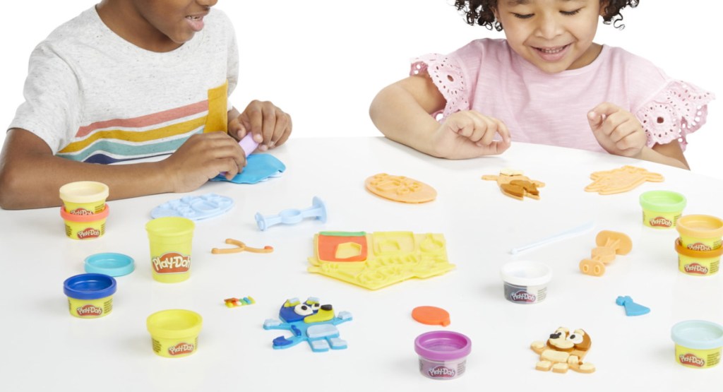 kids playing with bluey play doh set