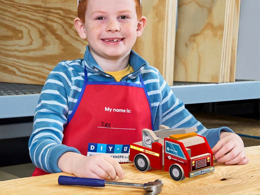 boy with firetruck at lowes