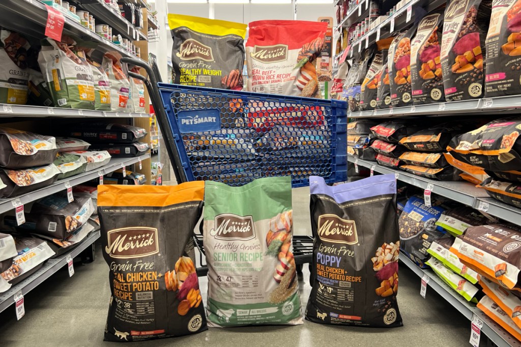 several merrick dog food bags in cart and on floor