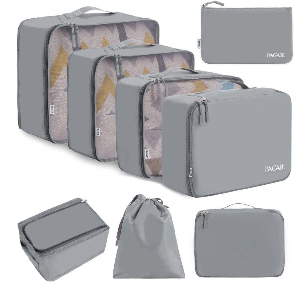 grey packing cubes, toiletry bags and shoe bag