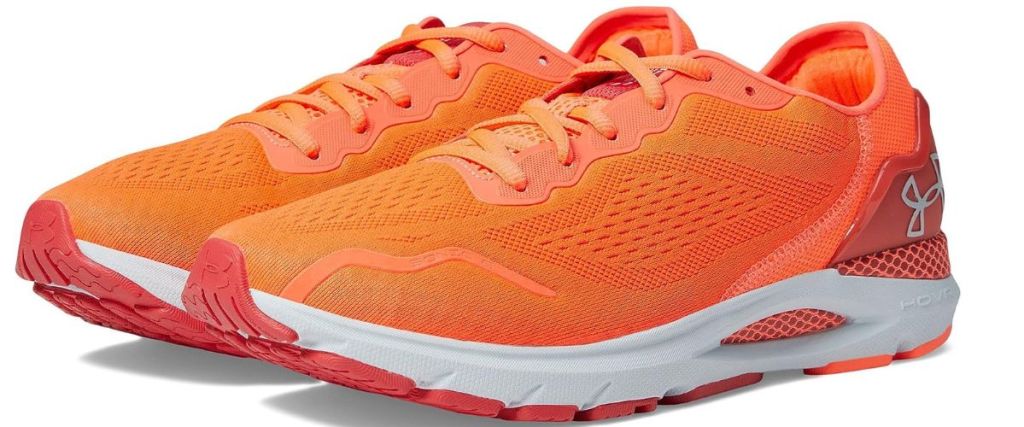 orange pair of running shoes