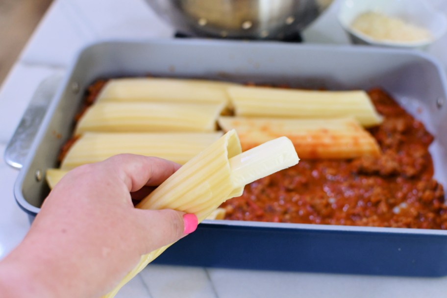 stuffing string cheese inside Manicotti