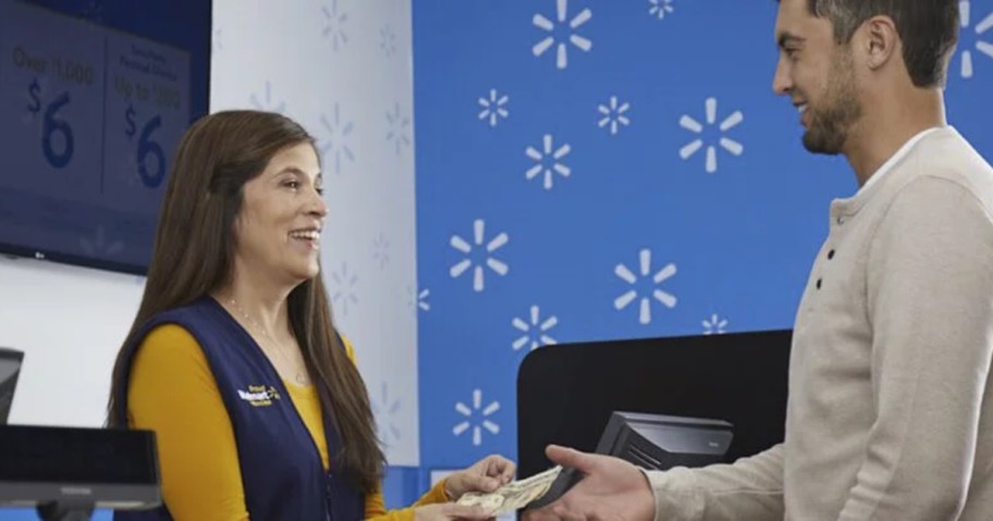 man receiving cash at Walmart Money Center