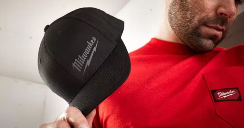 Men's Milwaukee Fitted Hat in black shown in man's hand