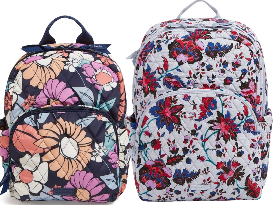 two floral print backpacks, one smaller with pink, orange, blue, and white flowers and one larger white with pink, red, and blue flowers
