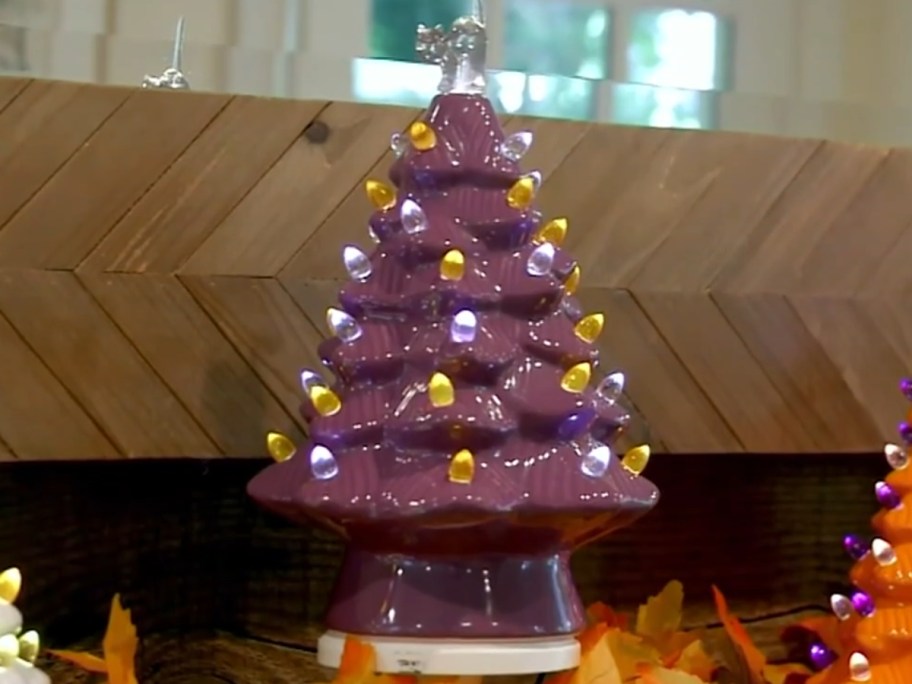 ceramic dark purple Halloween light up tree with Ghost on top