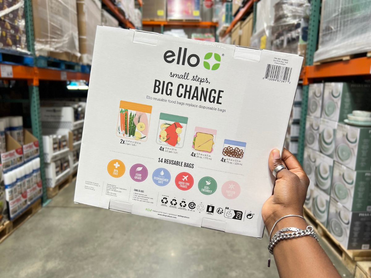ello Reusable Food Storage Bags 14-Piece Set at Costco with a woman's hand holding it