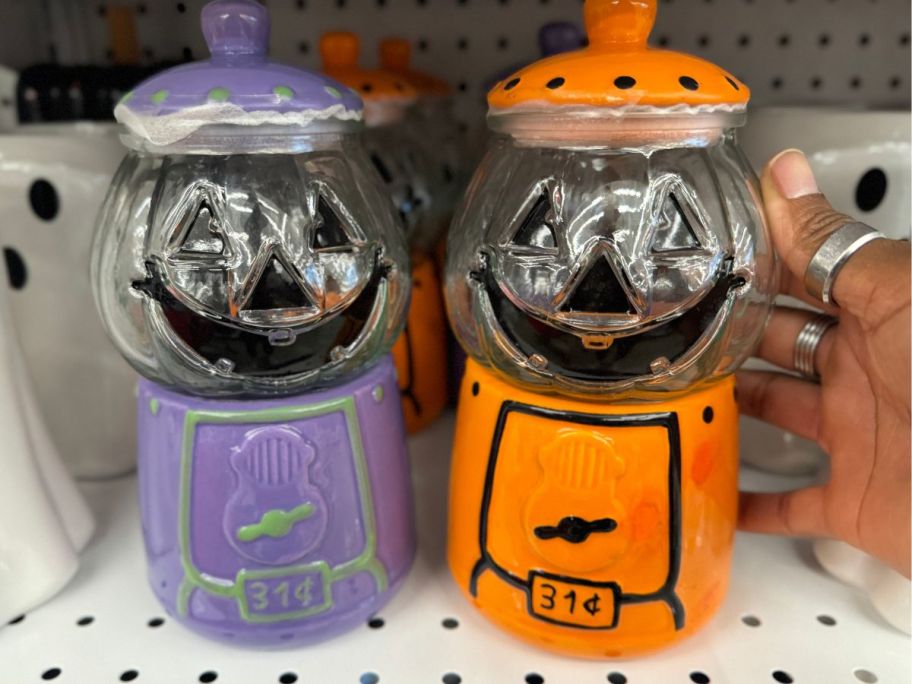 2 Ashland 7.5" Halloween Candy Machine Tabletop Accents on shelf in store