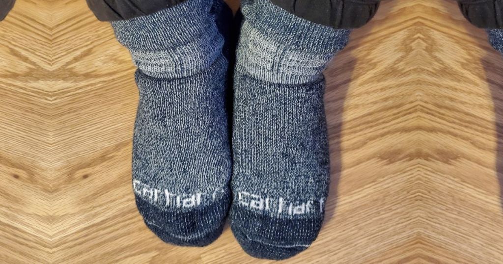 Feet wearing Carhartt Socks