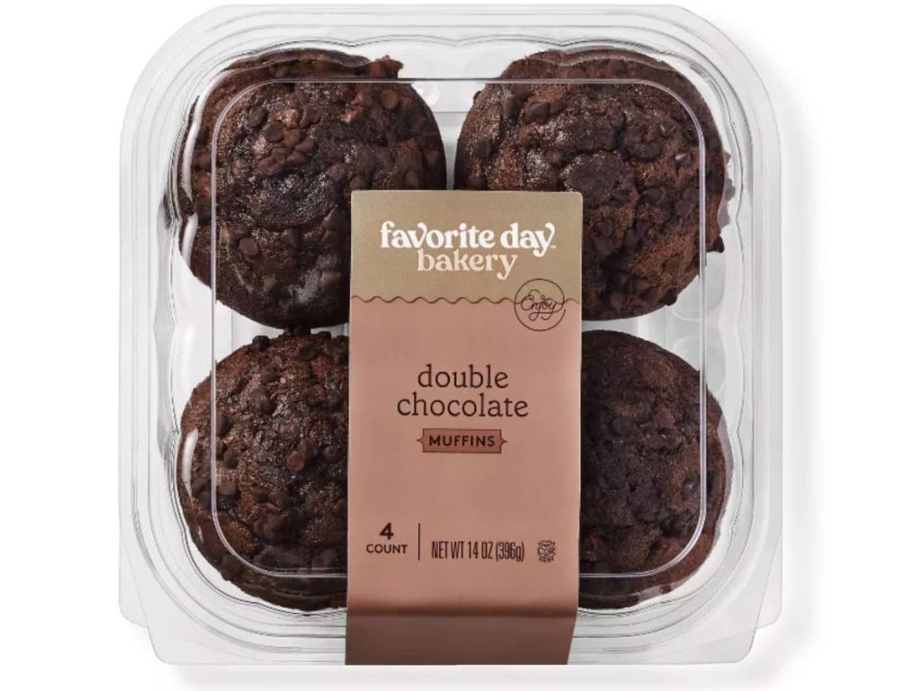 four chocolate muffins in plastic container