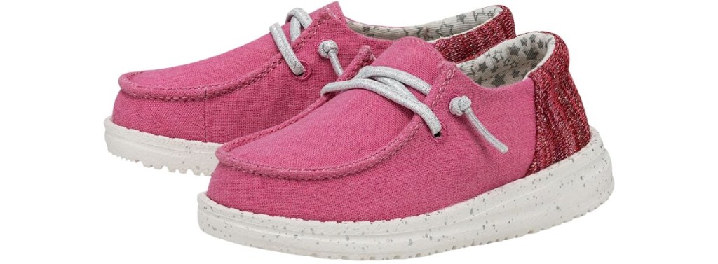 pair of kids pink hey dude shoes