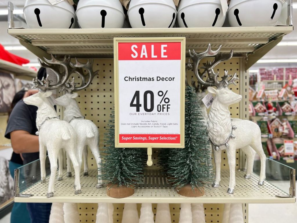White and Silver Deer Christmas Decor and Green Brush Trees at Hobby Lobby