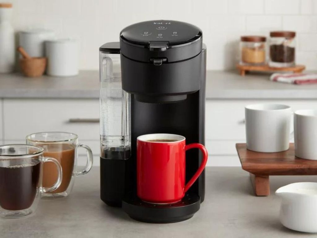 instant solo cafe coffee maker on counter in kitchen