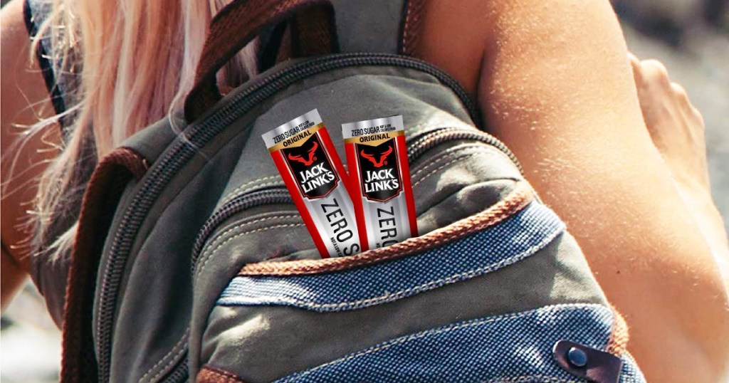 two Jack Link's Zero Sugar Beef Sticks sticking out from backpack