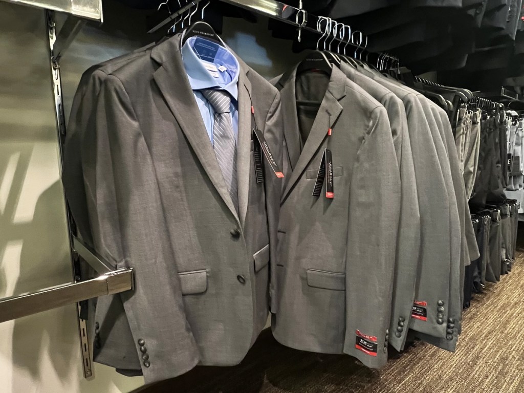 grey sport coats on store display rack