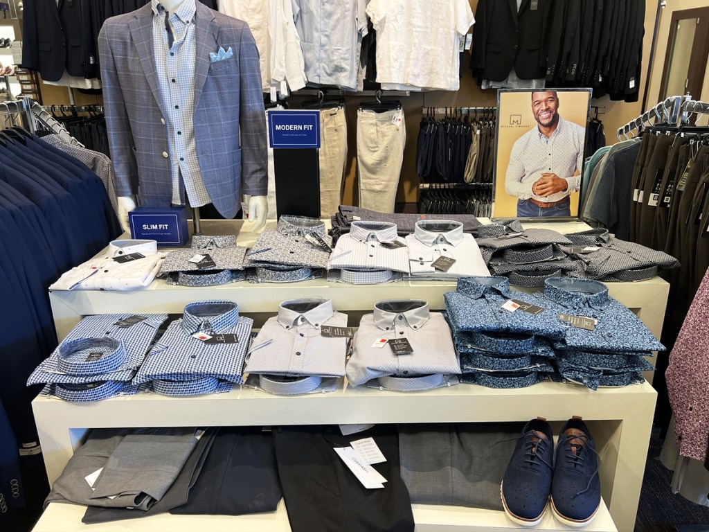 store display table full of men's dress shirts