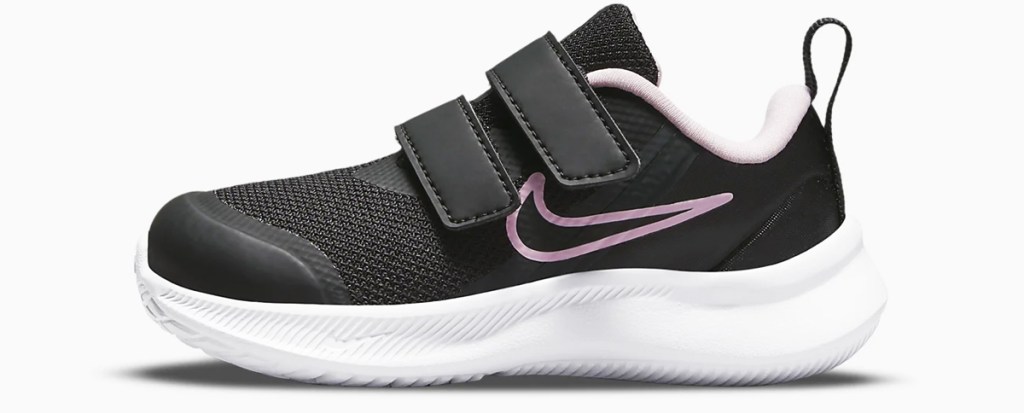 black and pink nike shoe
