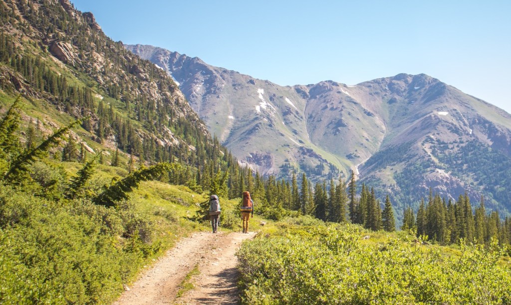 Two people on an Outward Bound FREE Veterans Expedition in the mountains